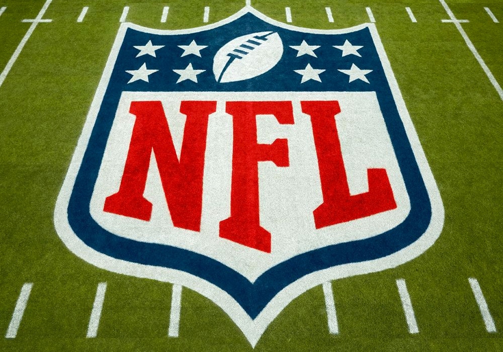 911 Caller Reported NFL Coach Choking Woman Before His Arrest in Florida